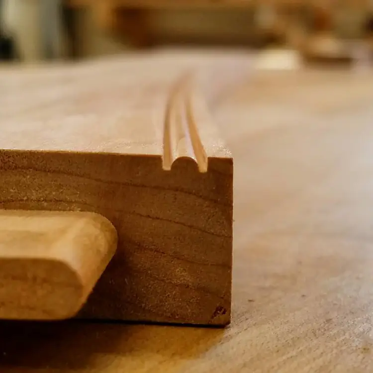 A detailed shot of the bottom stretcher and beading before installation