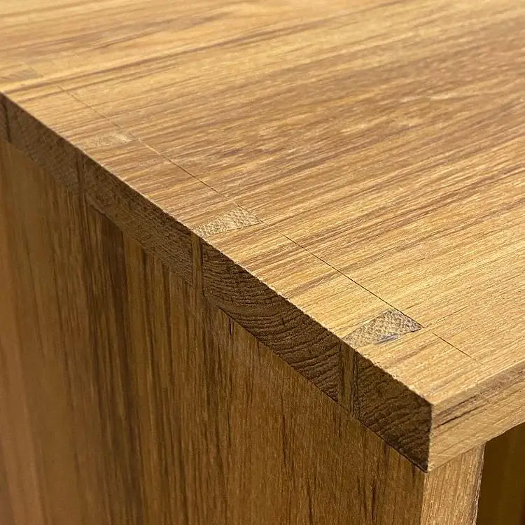 A detailed shot of dovetails in custom nightstand